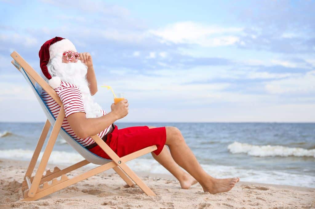 christmas in hawaii santa on a beach