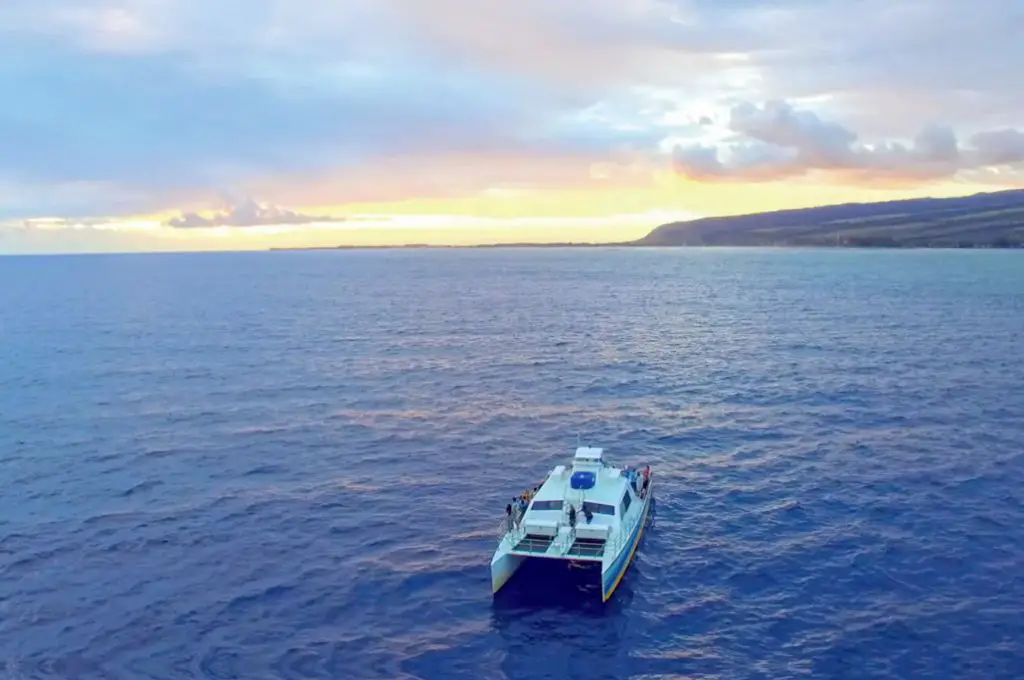 spring break in hawaii - sunset in kauai on a catamaran