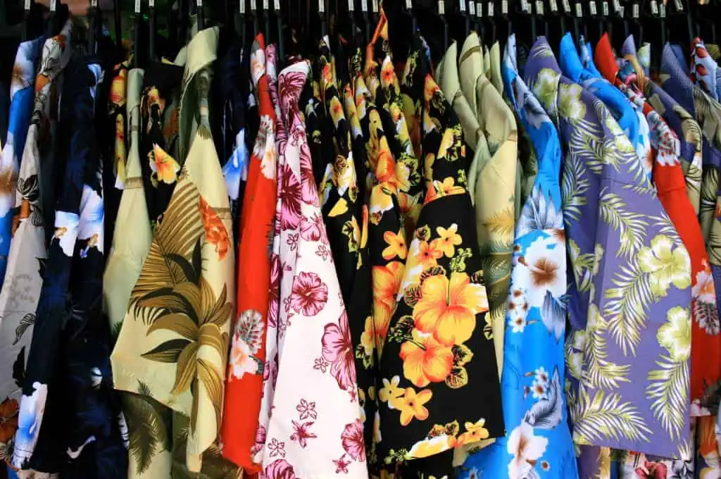 aloha shirts on a clothing rack